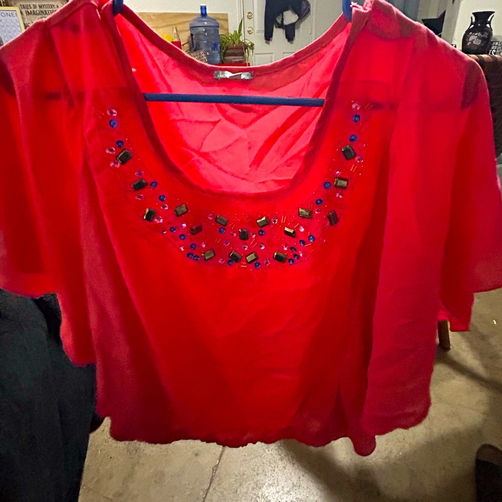 Charlotte Ruse coral colored blouse with jeweled detail